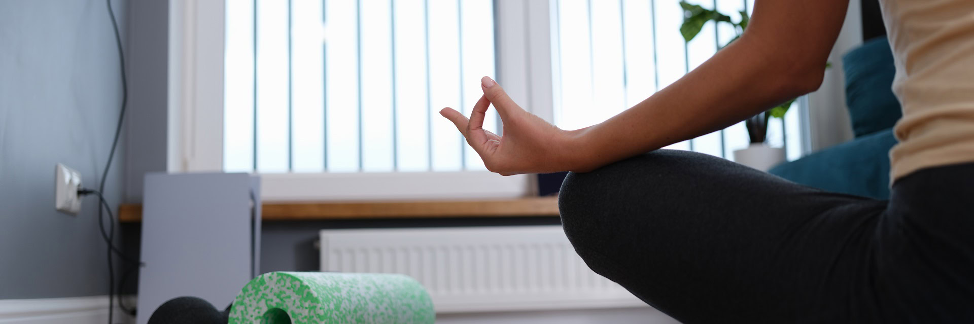 woman-sitting-floor-meditation-pose